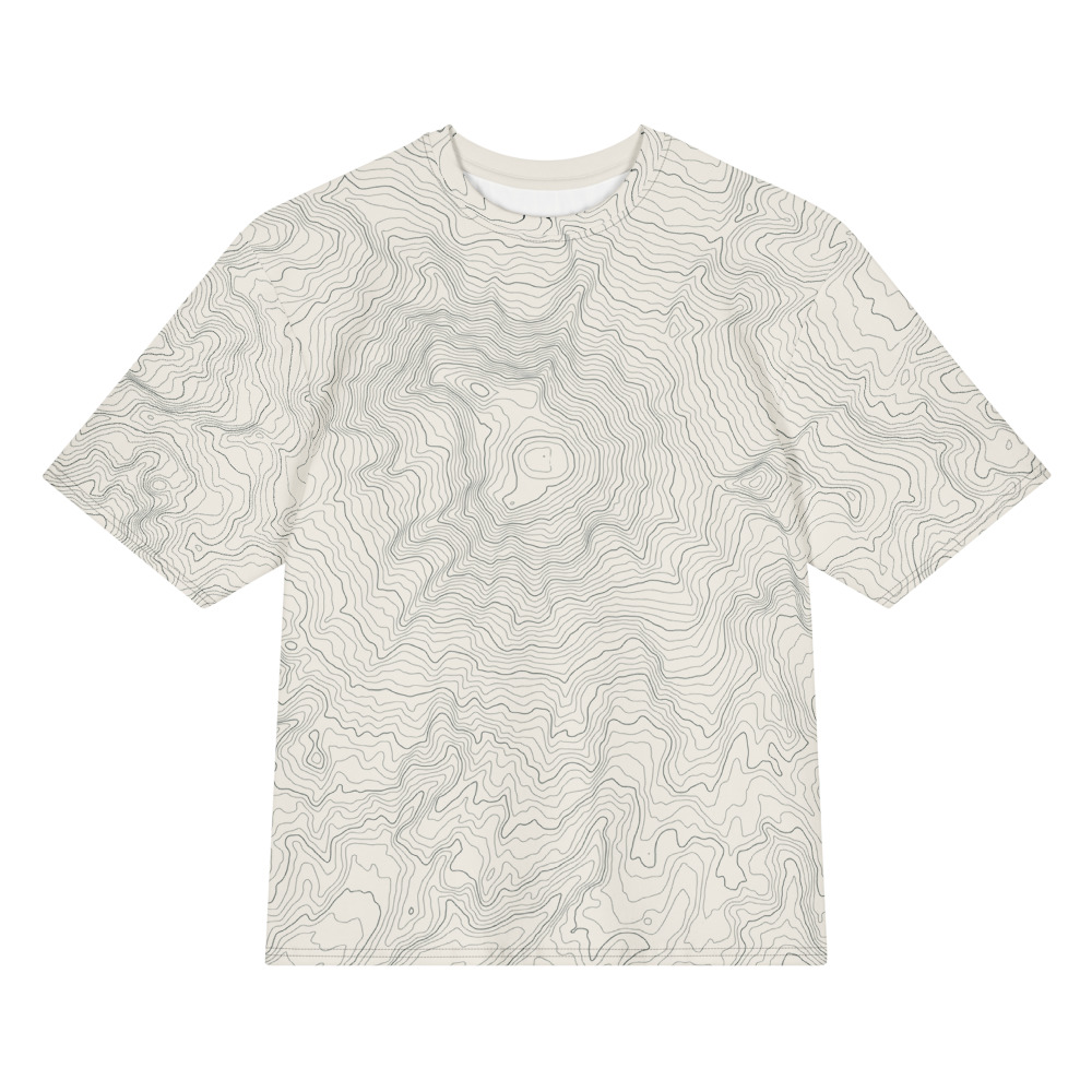 Mount Rainier elevation contours in dark ink on a warm cream oversized T with aligned collar and sleeves